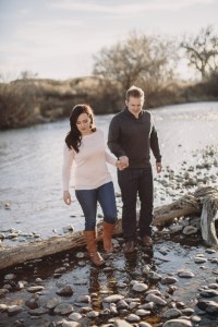 couple walking through stream together